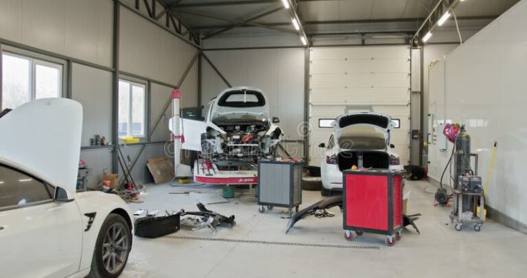 garage automobile moderne avec voitures en reparation