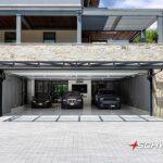 Comment Trouver une Location de Garage ou Hangar Adaptée à Vos Besoins garage-moderne-avec-porte-ouverte-et-voiture